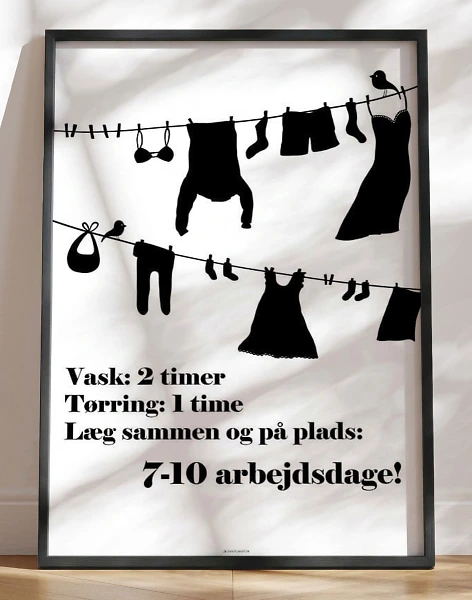 Hvid vaskeplakat med vasketøj